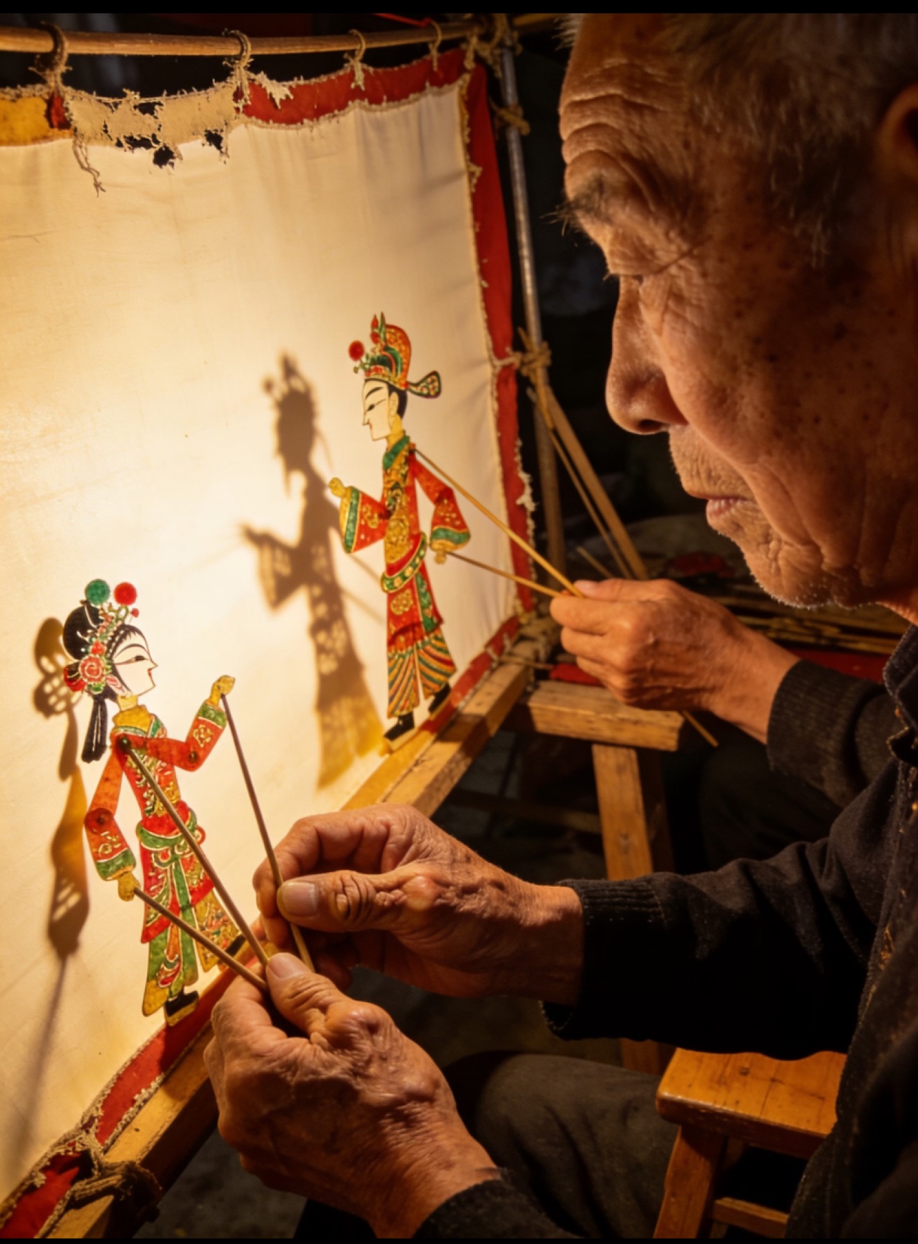 A craftsman at work by lamplight